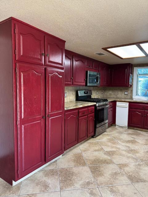 1703 Monte Grosso Drive, Merced CA: https://media.crmls.org/mediaz/f92792dd-b3ce-4c58-a03d-60c18b94283c.jpg