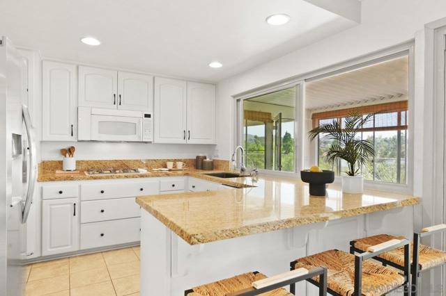 9633 Pebble Beach Dr, Santee CA: https://media.crmls.org/mediaz/f96abcaa-ee6f-40a5-9e81-198f686356af.jpg