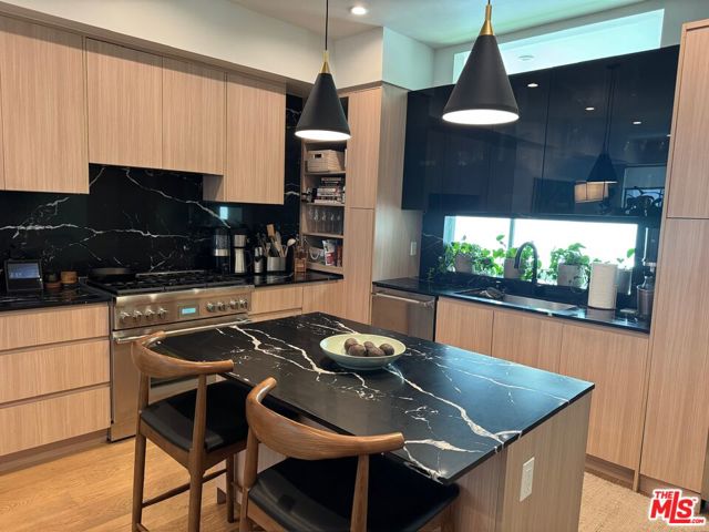 1144 N Detroit Street, West Hollywood CA: https://media.crmls.org/mediaz/f989c892-5ced-450e-bcef-76a3289633be.jpg