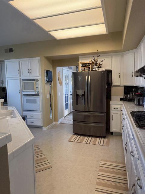 1676 W 11th Ave, Escondido CA: https://media.crmls.org/mediaz/f9c86985-ade5-4ec3-b1b2-80d4e93e5e87.jpg