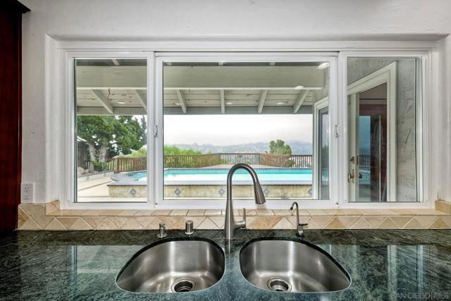 View from the Kitchen Sink towards the Pool and VIEWS!