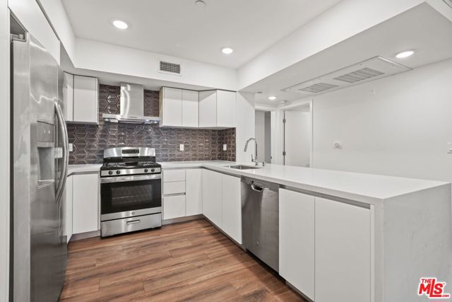 1223 Wellesley Avenue, Los Angeles CA: https://media.crmls.org/mediaz/fa6202d5-913f-4cd9-b716-2d7398d4ab56.jpg