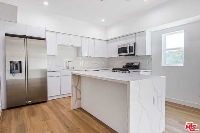 954 N Kingsley Drive, Los Angeles CA: https://media.crmls.org/mediaz/fafef856-bb8d-4afc-977c-c65f96a129fb.jpg