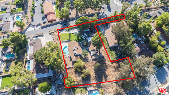 27933 Magic Mountain Lane, Canyon Country CA: https://media.crmls.org/mediaz/fb2208b1-911d-4364-8379-dc0f0b74083b.jpg