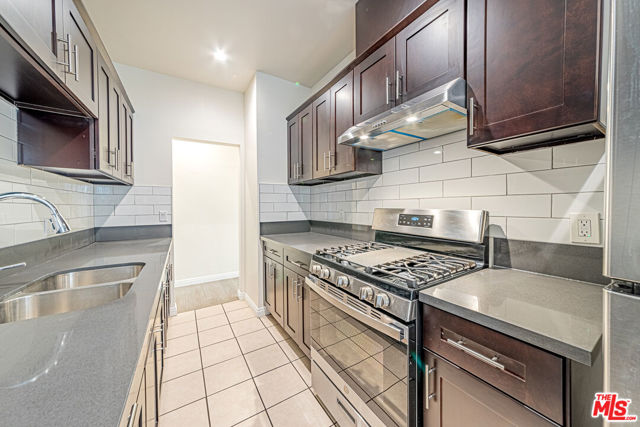 1156 S Bronson Avenue, Los Angeles CA: https://media.crmls.org/mediaz/fccbc556-305e-40a1-a8e3-05775c261077.jpg
