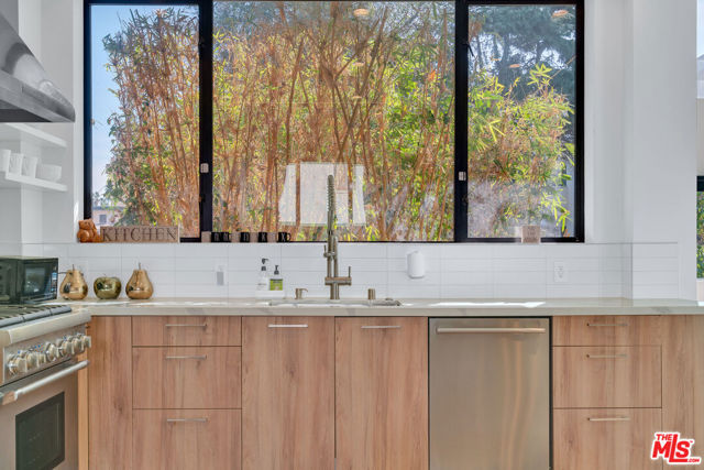 1447 1/4 N Martel Avenue, Los Angeles CA: https://media.crmls.org/mediaz/fcf71946-8b25-4fd6-8009-fe9a1d02c701.jpg
