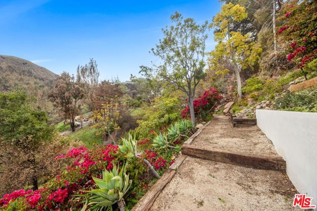 2382 Live Oak Meadows Road, Malibu CA: https://media.crmls.org/mediaz/fcf7d6cb-45db-4c4e-bef6-764e74a203af.jpg
