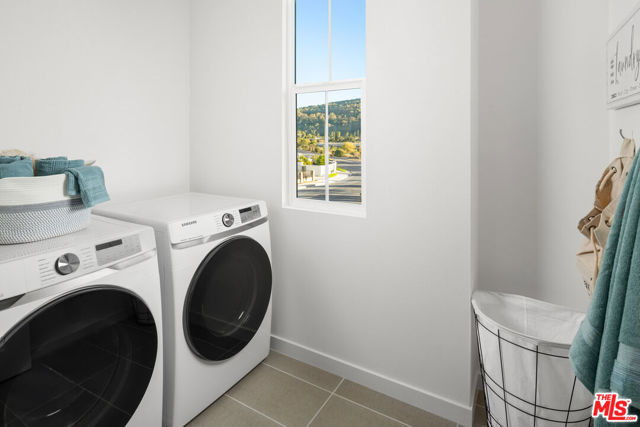 Model home laundry room. Used for representational purposes only. Appliances not included.