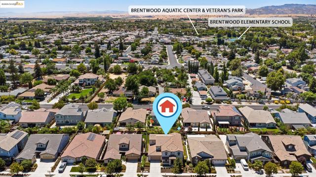 Aerial perspective of suburban area with mountains