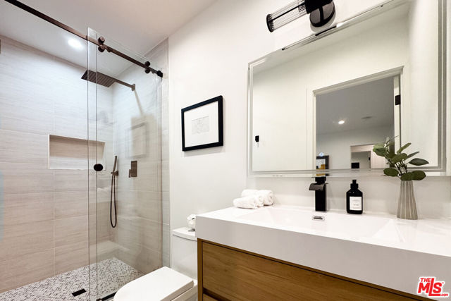 1363 S Curson Avenue, Los Angeles CA: https://media.crmls.org/mediaz/fd6ac0c8-99b7-481c-8c6f-fd9dbcba2e11.jpg