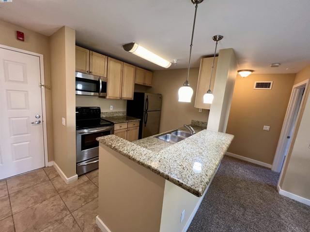 Image 5 of 38 For 6400 Christie Ave  5211