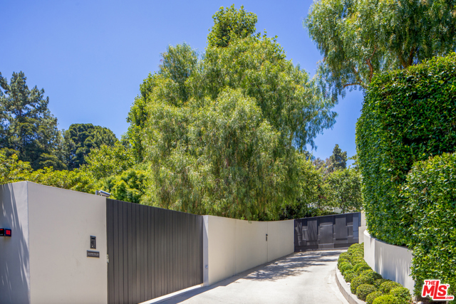 1196 Cabrillo Drive Beverly Hills, California One of Beverly Hills most private and secluded estates, situated on over 3 acres. A sprawling contemporary compound featuring a 9,000 sf (4 bd/6bth) main house, 2 guest houses, gorgeous pool with pool house and separate fitness facility and underground garage. Impeccably remodeled with the highest level of quality, taste, and craftsmanship. Featuring resort-like grounds, outdoor living/dining areas, a reflecting pond and manicured lawns. Beautiful city and ocean views throughout complete this incredible estate. Shown to pre-qualified clients only.