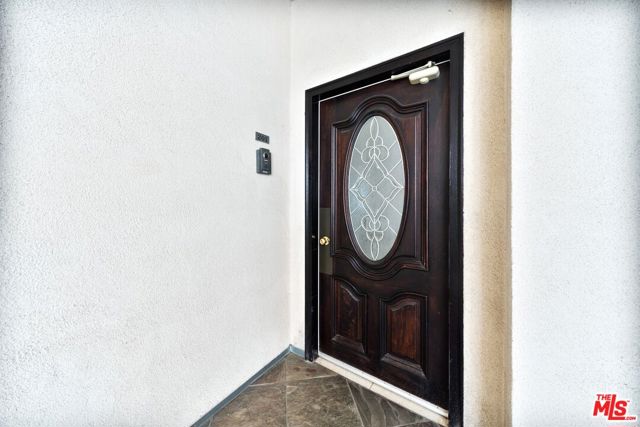 1043 S Kenmore Avenue, Los Angeles CA: https://media.crmls.org/mediaz/fee59a86-104c-4673-8d7c-a60df027a5fc.jpg