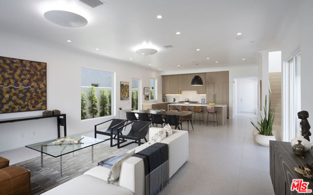 1626 BERKELEY Street Santa Monica, California Modern, award-winning courtyard compound on a quiet street in Santa Monica designed by Inaba Williams Architects, AIA. Nearly 3,600 SF of California living with generous outdoor spaces on both levels. Gallery walls and high ceilings bathed with natural light through thoughtfully articulated windows, skylights and Fleetwood sliding doors. Privacy, serenity, and effortless flow between expansive living and dining areas, chef's kitchen with Thermador appliances, entertaining courtyards and pool. Primary bedroom suite equipped with private outdoor terrace, huge closets and a spa bathroom with Italian terrazzo floors. Flexible two-story live/work accessory unit with separate entry, two bathrooms, kitchenette. All this, close to transit, Sawtelle, the tech corridor, Bergamot, all westside amenities and the beach.