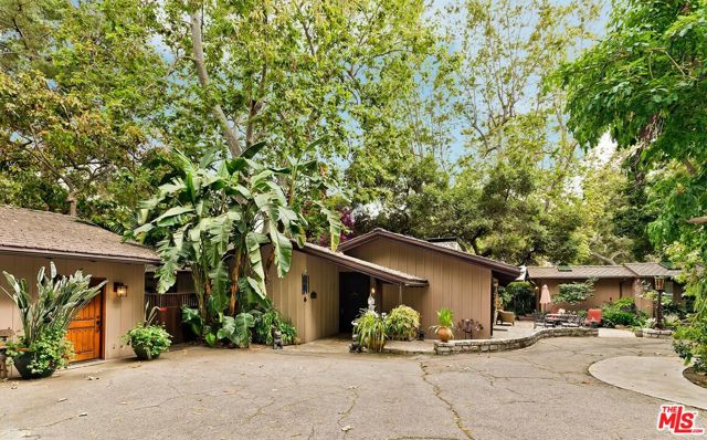 EXTRAORDINARY RARE FLAT WOODED ACRE OF LAND,  fabulous tennis court, and original home in picturesque Rustic Canyon.  Look no further to acquire one of the last estate size properties available to build your own private sanctuary in the city.  Entertain under the canopy of old growth trees. Play a game of tennis.  Go for a scenic hike in historic Will Rogers State Park.  A compound of 3 structures and small outbuilding.  Nothing compares to this serene creekside setting. Multimillion dollar homes close by. Close to Palisades Village, beach, restaurants, shopping, and equestrian center. Geology, survey and investigations available. Architectural plans by a noted architect . No open houses. By appointment only. Tenant occupied. Sale "as is"
